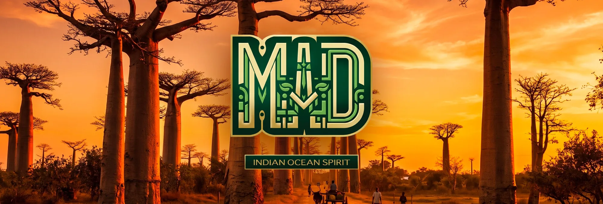 Le logo M.A.D « Indian Ocean Spirit » devant une allée de baobabs au coucher du soleil, à Madagascar